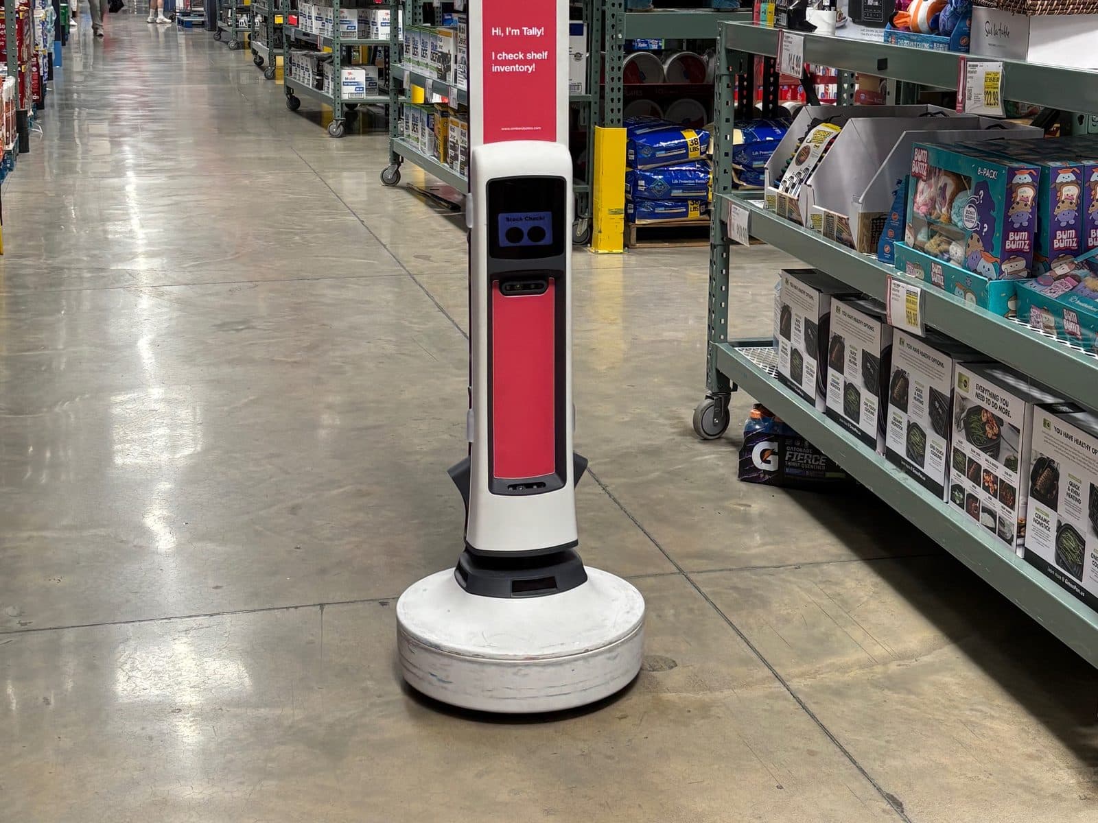 Tally, Simbe's inventory robot, moving down a supermarket aisle